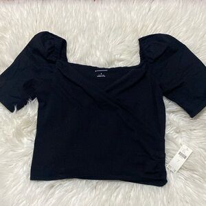 Anthropologie cross over puffy sleeves